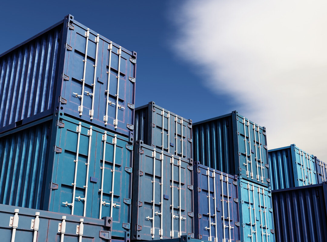 Einige Stapel von blauen Containern.