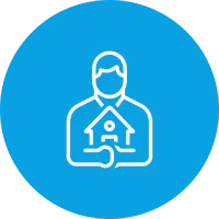 Man holding a house in his hands, symbol of real estate or home ownership.